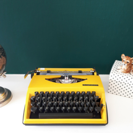 Typemachine Triumph Tippa okergeel
