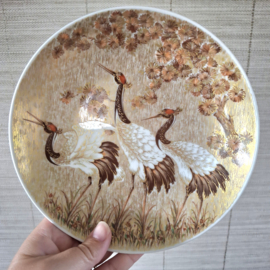 Wandbord kraanvogels goud