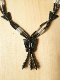 Collier papillon en Hématite