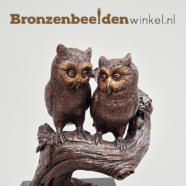 Beeldjes van uilen op stam BBW0801br