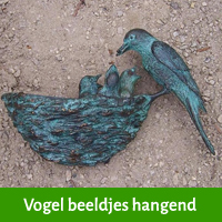 vogel beeldje schutting