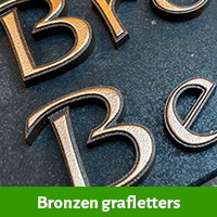 Bronzen grafletters