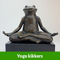 Yoga kikker beelden