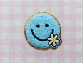 Strijkapplicatie badstof smiley met bloem blauw 