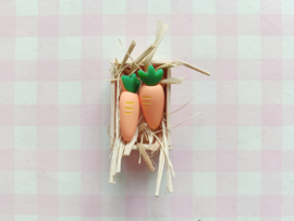 Kratje met stro en wortels