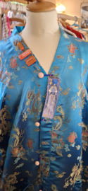 Up cycling van kleding, door het leren maken van badges en illustraties.