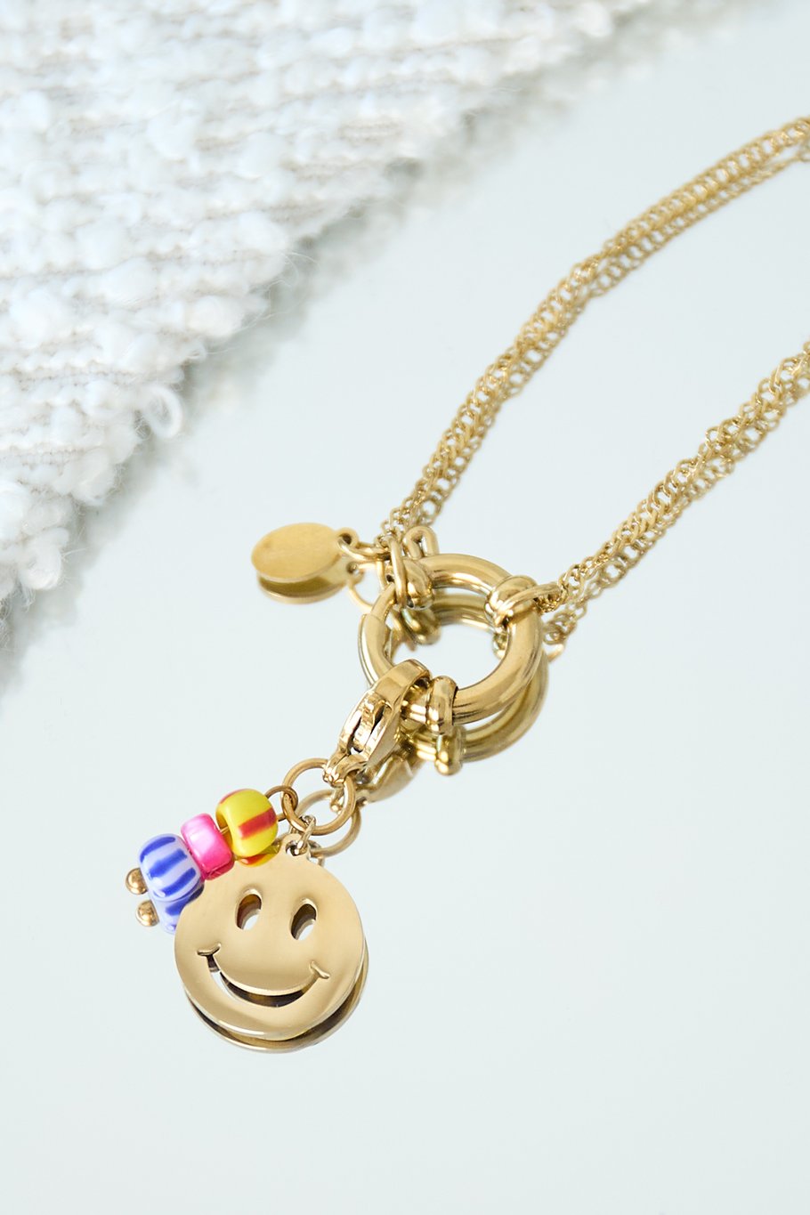 Colored smiley jewelry charm - gold