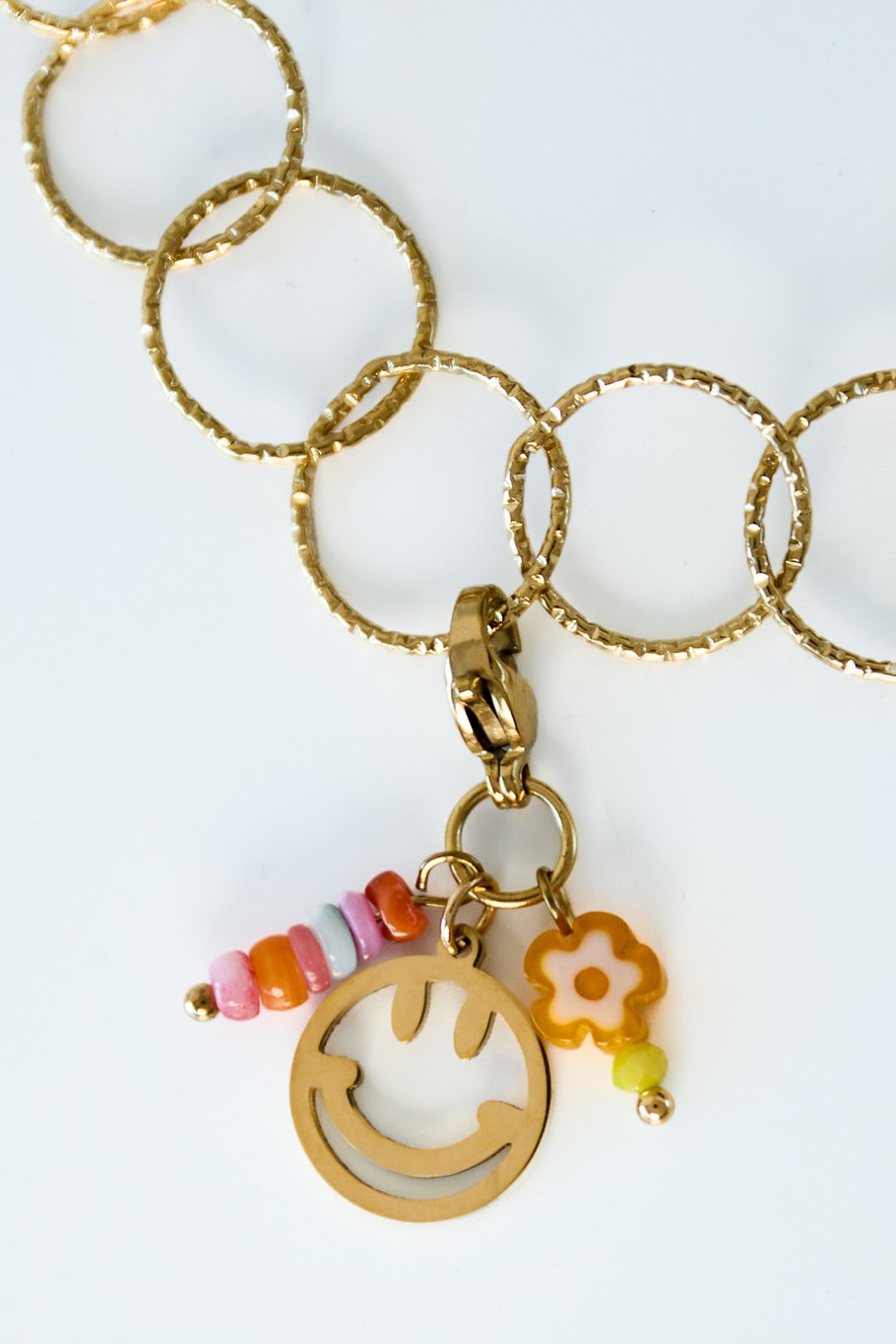 Happy smile jewelry charm - gold