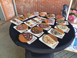 Stroopwafel kraam 2 uur uitdelen.