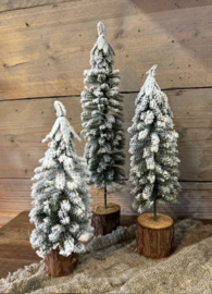 Kerstboom op stam  met sneeuw effect