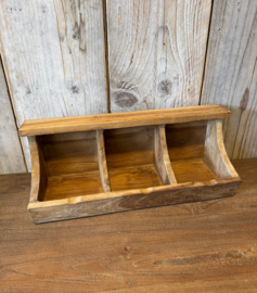 Kleine houten gruttersbak
