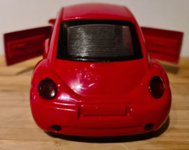 Volkswagen New Beetle rood schaal  1 op 34 met frictie motor