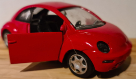 Volkswagen New Beetle rood schaal  1 op 34 met frictie motor