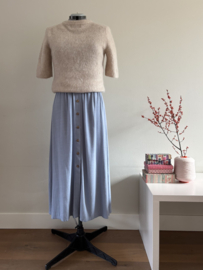 Damesknopenrok lichtblauw