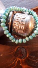 Glaskralen armband, met turquoise opal facet kralen
