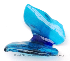 Vlinder in aqua en zeegroen glas
