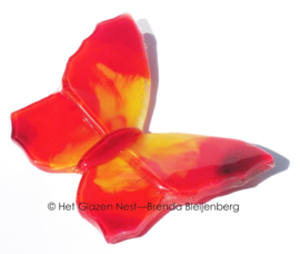 Glazen vlindertje in rood en oranje kleuren