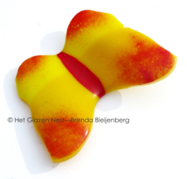 Vlinder in geel en oranje glas