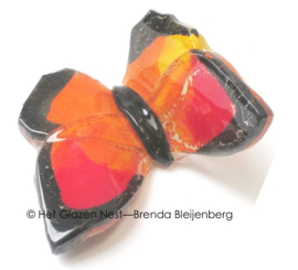 Kleine oranje vlinder van glaskunst