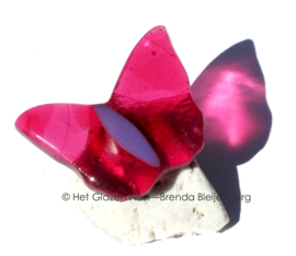 Kleine roze glazen vlinder