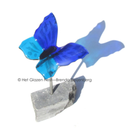 Vliegende blauwe vlinder