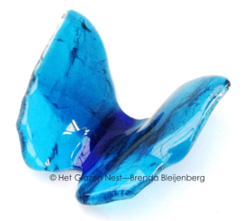Vlinder in aqua en zeegroen glas