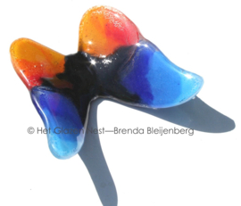 Vlinder in bijzondere kleuren van glas