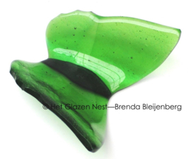 Glazen vlinder in rustig groene kleuren