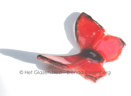 Kleine rode vlinder van grafkunst