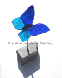 Vliegende blauwe vlinder