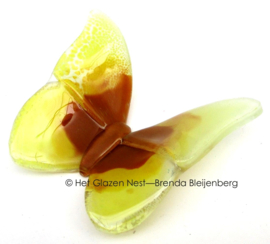 Glazen vlinder in gele kleuren