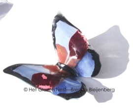 Glazen vlinder in lila variaties