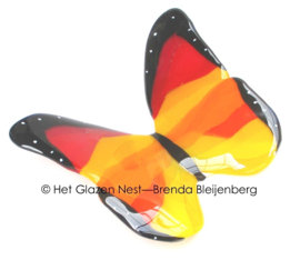 Glazen vlinder in oranje, geel en rood