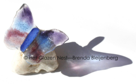 Kleine paarse vlinder van glaskunst