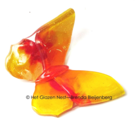 Glazen vlinder in oranje kleuren