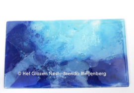 Glasplaat met blauwe lucht