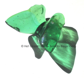 Vlinder in rustig groen glas