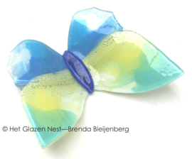 Glazen vlinder in zachte kleuren