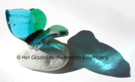 Vlinder in rustig zeegroen glas