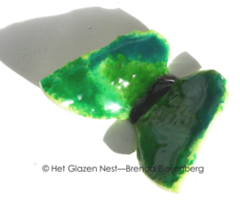 Vrolijke vlinder in grasgroene kleuren