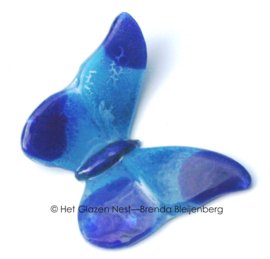 Kleine blauwe vlinder van glaskunst
