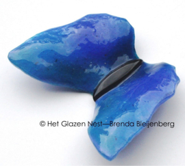 Blauwe vlinder met zeegroene accenten