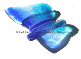 Kleine vlinder in aqua glas