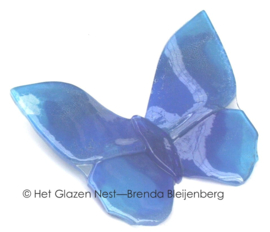 Blauwe vlinder in glaskunst