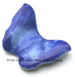 Kleine blauwe glas vlinder