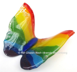 Speelse regenboog vlinder van glas