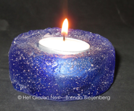 Waxinelichtje in blauw glas casting