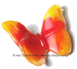 Oranje vlinder in glaskunst