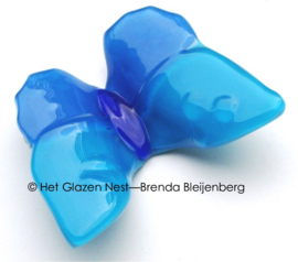 Glazen vlinder in aqua blauw
