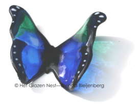 Speels glazen vlinder in blauw en zeegroen